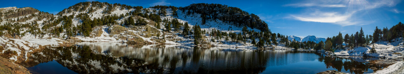 Chamrousse France 06 11 2022 winter hike around Lac Achard, pretty mountain lake located at 1917 meters above sea level, snowy landscapes - obrazy, fototapety, plakaty