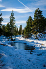 Chamrousse France 06 11 2022 winter hike around Lac Achard, pretty mountain lake located at 1917...