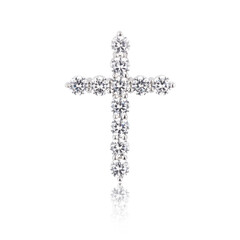 Silver cross pendant with zircons isolated on white background