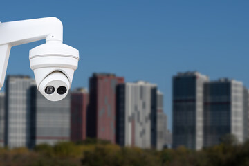 CCTV monitoring, security cameras. Backdrop with views of the city