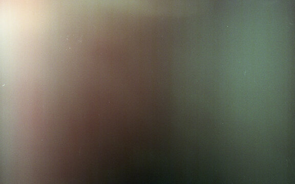 35mm film with light leaks, grain, scratches, and salt emulations scanned for use as textures in graphic and photo design