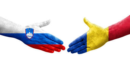 Handshake between Romania and Slovenia flags painted on hands, isolated transparent image.