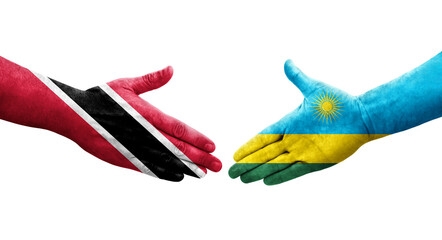 Obraz premium Handshake between Rwanda and Trinidad Tobago flags painted on hands, isolated transparent image.
