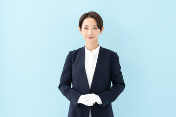 ビジネス・女性・ブルーバック