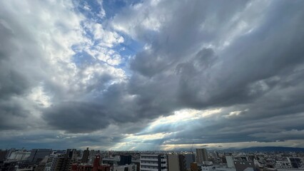 Fototapeta na wymiar clouds over city
