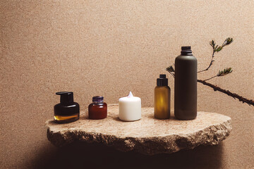 Relax composition massage stone, white pump lotion bottle,green plant on pine wood table, spa, clean