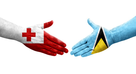 Handshake between Saint Lucia and Tonga flags painted on hands, isolated transparent image.