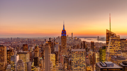 Fototapeta na wymiar City view of New York Manhattan skyscrapers at golden hour.