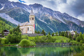 Church and Solden village near Passo dello Stelvio, South Tyrol alps, Italy