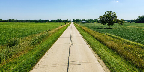 Rural country road surrounded by farm land