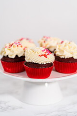 Red Velvet Cupcakes with White Chocolate Ganache Frosting