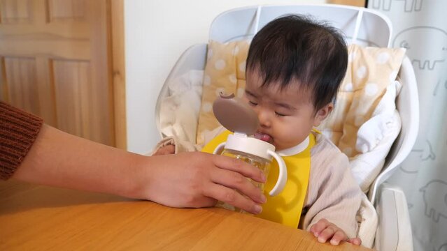 Japanese infant eating baby food