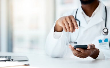 Doctor, hands and phone in hospital office for telehealth, online consultation or research. Healthcare, mobile tech and black female physician on 5g smartphone, wellness app or checking medical email