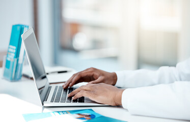 Laptop, doctor and hands typing an email with medical research from hospital survey data results or feedback. Digital, keyboard and healthcare worker networking online after writing a science report