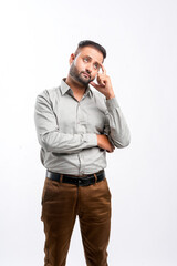 Indian man giving thinking expression on white background.