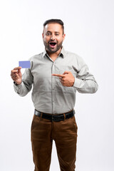 Indian man showing card on white background