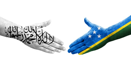 Handshake between Solomon Islands and Afghanistan flags painted on hands, isolated transparent image.