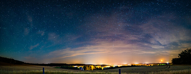night city panorama with starry sky