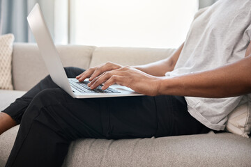 Laptop, home and hands of black man typing email, social media content writing article or contact...