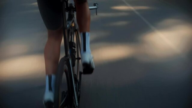 Strong Triathlete cyclist training on bicycle	