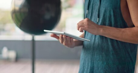 Gym, health and man with tablet on fitness app planning workout routine online. Technology, exercise and internet, athlete using mobile application for sports training plan on digital touchscreen.