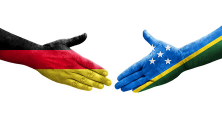 Handshake between Solomon Islands and Germany flags painted on hands, isolated transparent image.