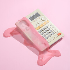 Creative minimalist layout. Retro phone with slime on a pink background. Surreal summer idea. Conceptual pop