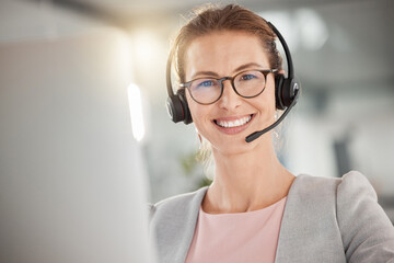 Telemarketing, customer service and happy woman at call center office pc for online consulting or...