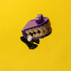 Halloween jumoing jaw on yellow background