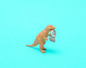 Dinosaur with a golden crown on a blue background