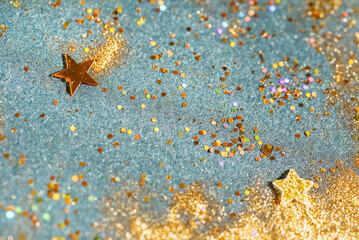 gold background with Christmas stars