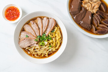egg noodles with stewed duck in brown soup