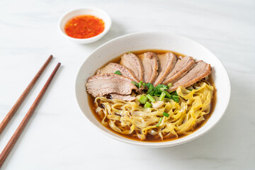 egg noodles with stewed duck in brown soup