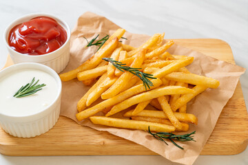 French fries with sour cream and ketchup