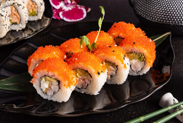 japanese sushi on the dark background © Maksim Shebeko