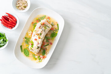 steamed sea bass fish with herbs