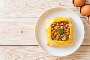 egg wrap or stuffed egg with minced pork and vegetable