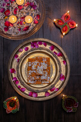 Festival of lights Diwali Celebration with Traditional Indian delicacy  prepared with Moong Dal or Yellow Lentils