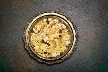 Healthy evening snack for weight loss, made with roasted chiwda, puff rice, cashew nuts, peanuts, makhana and dry coconut flakes