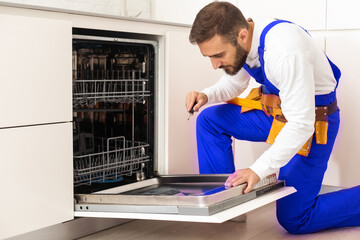 Professional worker estimating cost for broken dishwasher