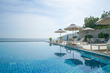 bed pool around swimming pool with sea background