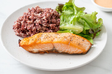 grilled salmon fillet steak with rice berry and vegetable