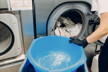 Dry cleaning clothes. Clean cloth chemical process. Laundry industrial dry-cleaning