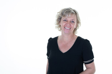 Headshot of blond senior woman smiling standing at isolated white background