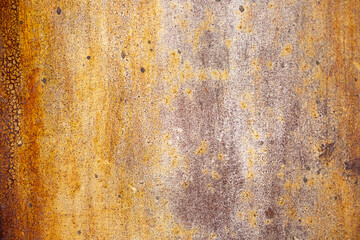 Texture of rusty iron, cracked paint on an old metal surface. Sheet of rusty metal with cracked and peeling paint, background for design with copy space.