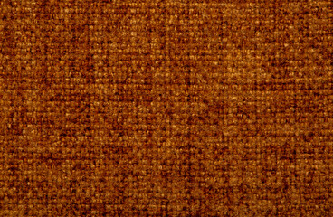 Close-up fabric swatches as a background. The texture of the material with patterns of weaving close-up. Upholstery fabric for interior decoration.