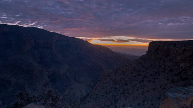 Sunrise sky 4K time lapse on the Jebel shams mountain in Oman