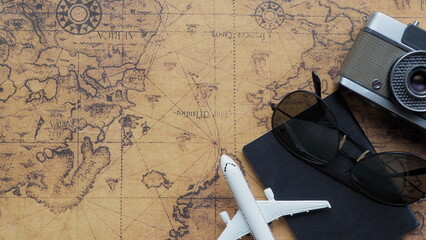 Top view of passport and glasses, world map, camera ,passport with world map travel concept