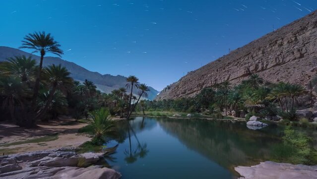 4k time lapse at night with stars trail in Khalid Bani wadi, Oman.