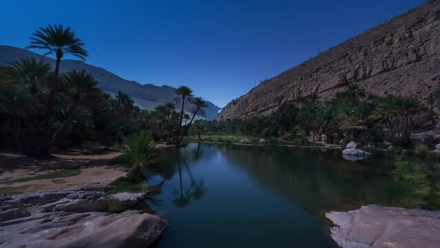 4k time lapse at night with stars in Khalid Bani wadi, Oman.